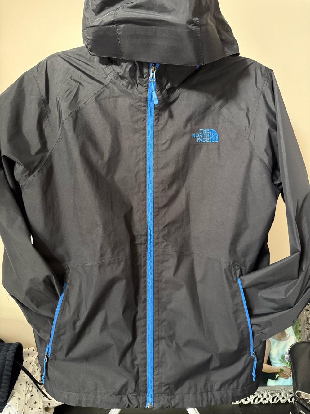 The North Face Men's Black waterproof Hooded Shell Jacket with Blue Trim
